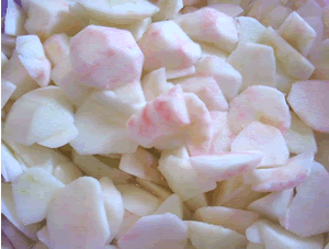 peeled cored and slices of apples for making apple sauce